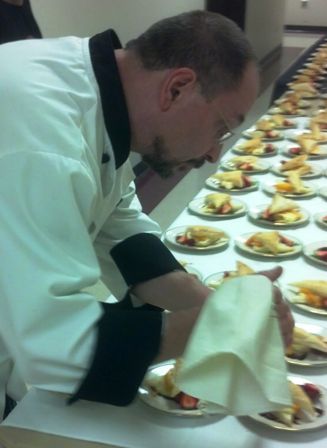 Ted serving dinner